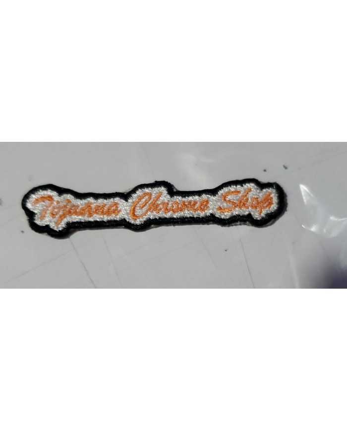 WP-PARCHE DE LETRAS BORDADO NARANJA